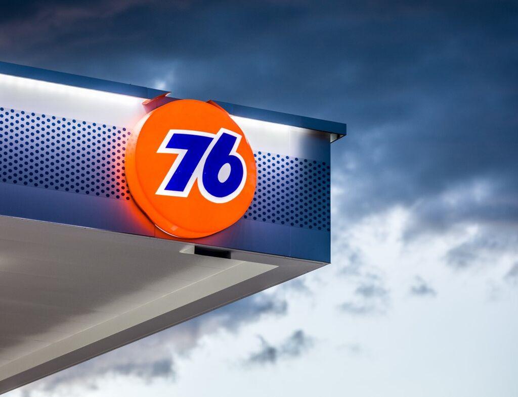 focused shot on the 76 brand at a gas station